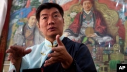 Lobsang Sangay, the incumbent prime minister of the Tibetan government-in-exile, speaks to media after being re-elected for second term in office in Dharmsala, India, Wednesday, April 27, 2016.