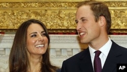 Britain's Prince William and his fiancee Kate Middleton pose for the media at St. James's Palace in London, after they announce their engagement., November 16, 2010