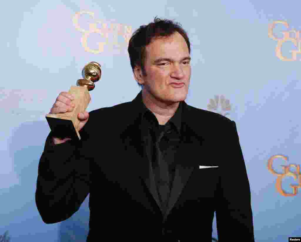 Director Quentin Tarantino holds the award for Best Screenplay - Motion Picture for "Django Unchained" backstage at the 70th annual Golden Globe Awards in Beverly Hills, California, January 13, 2013.