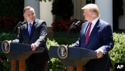 El presidente de EE.UU., Donald Trump, y el presidente de Polonia Andrzej Duda, en conferencia de prensa en el Jardín de las Rosas de la Casa Blanca, el miércoles 12 de junio de 2019.