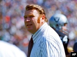 FILE - Oakland Raiders coach John Madden stands on the sideline during an NFL football game in October 1978.