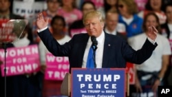 Republican presidential candidate, Donald Trump, speaks during a campaign rally late Saturday, Nov. 5, 2016, in Denver. (AP Photo/David Zalubowski)