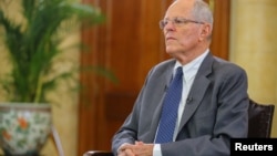 Peruvian President Pedro Pablo Kuczynski gives an interview to the media at the Government Palace in Lima, Dec. 17, 2017.