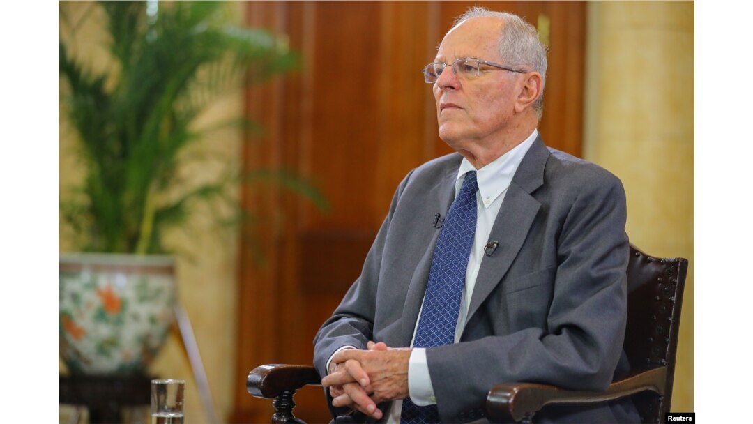 Peruvian President Pedro Pablo Kuczynski gives an interview to the media at the Government Palace in Lima, Dec. 17, 2017.