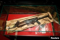 Evidence is displayed at the trial of Mehdi Nemmouche at the Justice Palace in Brussels, Jan. 10, 2019. Mehdi Nemmouche is accused of shooting dead four people at a Jewish museum in Belgium in 2014.