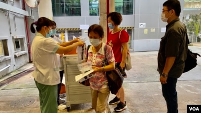 中国医疗专家抵达香港协助提高病毒检测量各界忧dna被 送中