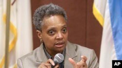 FILE - Then-mayoral candidate Lori Lightfoot participates in a candidate forum sponsored by One Chicago For All Alliance at Daley College in Chicago, March 24, 2019. Lightfoot was elected mayor on April 2, 2019.