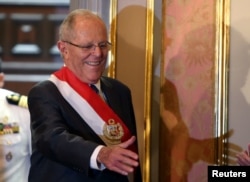 Peru's President Pedro Pablo Kuczynski attends the swearing-in ceremony of new Interior Minister Vicente Romero at the government palace in Lima, Peru Dec. 27, 2017.