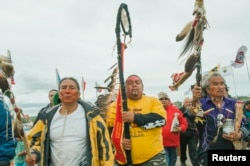 Protesters demonstrate against the Energy Transfer Partners' Dakota Access oil pipeline near the Standing Rock Sioux reservation in Cannon Ball, North Dakota, Sept. 9, 2016.