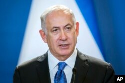 Israeli Prime Minister Benjamin Netanyahu speaks during his joint press conference with his Hungarian counterpart Viktor Orban in the Parliament building in Budapest, Hungary, July 18, 2017.