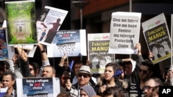 Hundreds of protesters rally outside the Immigration Department offices in Sydney, Australia, Aug. 12, 2019. 