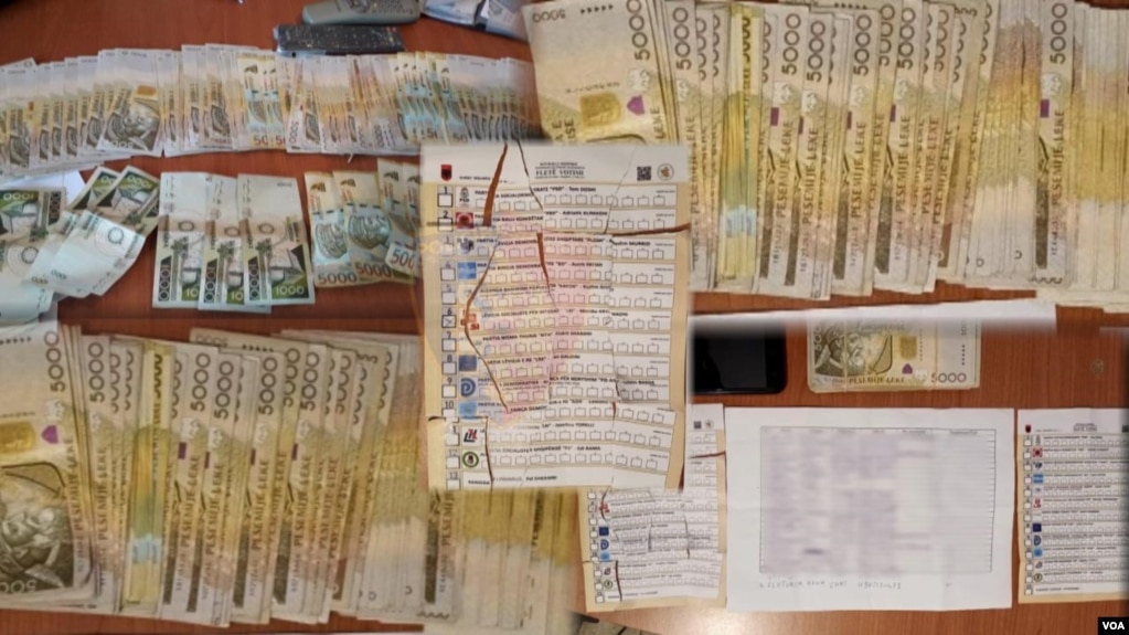 Police photo purportedly showing vote trafficking in Albania