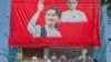 Lãnh tụ đối lập Myanmar Aung San Suu Kyi rời trụ sở đảng Liên minh Dân chủ Toàn quốc NLD sau khi tuyên bố về kết quả cuộc tổng tuyển cử tại Yangon, ngày 9/11/2015.