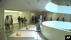 “Marking Infinity,” Lee Ufan’s first retrospective in an American museum, fills the Guggenheim’s Rotunda floor, which was designed by architect Frank Lloyd Wright.