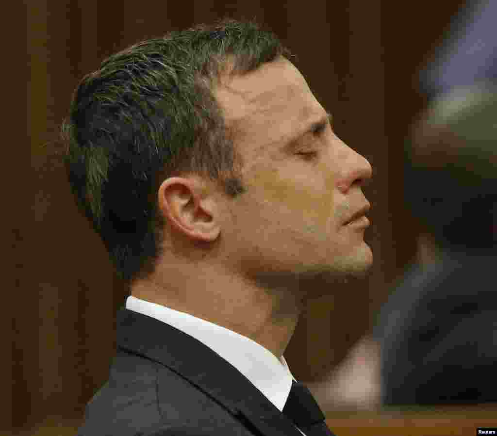 Olympic and Paralympic track star Oscar Pistorius reacts as he listens to Judge Thokozile Masipa&#39;s verdict at the North Gauteng High Court in Pretoria, Sept. 11, 2014.&nbsp;