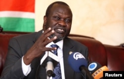 FILE - South Sudan's rebel leader Riek Machar addresses a news conference in Ethiopia's capital Addis Ababa, Oct. 18, 2015.