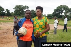 While in Malawi Mjeje's skills dazzled many people. In this photo she posed with Suzgo Ngwira, of the Malawi Women's Footaball Committee.