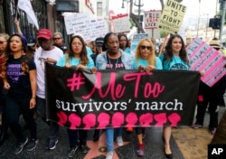 FILE - Participants march against sexual harassment and assault at the #MeToo March in the Hollywood section of Los Angeles, California, Nov. 12, 2017. Data show that about 80 percent of victims of sexual violence knew their offender.