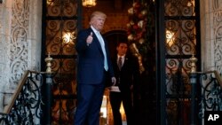 President-elect Donald Trump gives thumbs up after speaking to reporters at Mar-a-Lago, Palm Beach, Florida, Dec. 28, 2016.