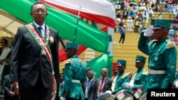 Madagascar's new president Hery Rajaonarimampianina attends his inauguration ceremony at the Mahamasina Stadium in the capital Antananarivo January 25, 2014. Rajaonarimampianina, who won the first elections since a coup in 2009, took office on Saturday bu