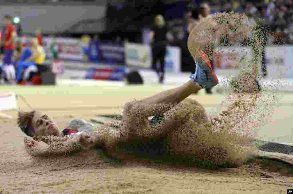 Radek Juska of the Czech Republic makes an attempt in the men&#39;s long jump qualifying at the European Athletics Indoor Championships at the Emirates Arena in Glasgow, Scotland.