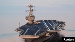 ກຳປັ່ນບັນທຸກເຮືອບິນ USS George H.W. Bush (ລຸ້ນ CVN 77) ທີ່ຖືກສັ່ງໃຫ້ເຄື່ອນເຂົ້າໄປ ຍັງເຂດອ່າວເປີເຊຍ. 