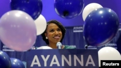 Balloons fall around Democratic candidate for U.S House of Representatives Ayanna Pressley at her primary election night rally in Boston, Sept. 4, 2018.