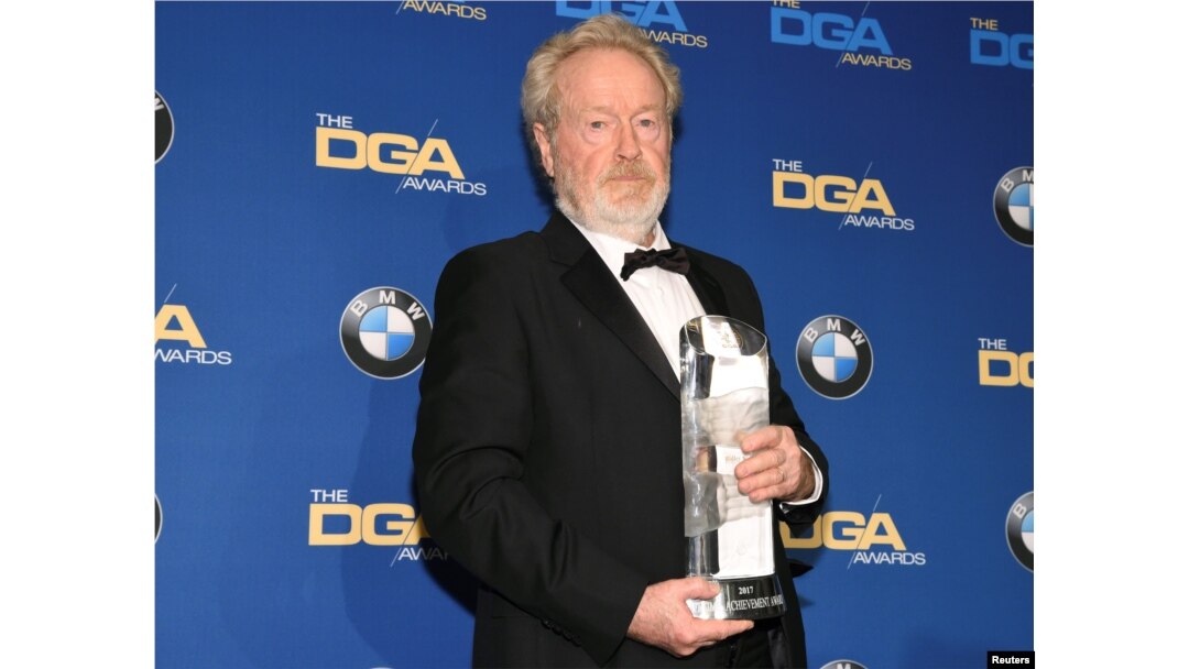 FILE - Ridley Scott, winner of the Lifetime Achievement in Feature Film Award, poses for photographers at the 69th annual DGA Awards in Beverly Hills, California, Feb. 4, 2017.