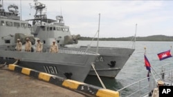 FILE - Cambodian navy crew members stand on a patrol boat at the Ream Naval Base in Sihanoukville, Cambodia, July 26, 2019. The U.S. Treasury Department on Nov. 10, 2021, imposed sanctions on two senior Cambodian defense officials over allegations of graft.