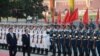 老挝国家主席朱馬利·賽雅貢（前排左二）访问中国。左一是中国国家主席习近平（资料照片）