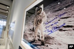A print of astronaut Neil Armstrong's photograph of fellow Apollo 11 astronaut "Buzz" Aldrin standing on the moon, to be offered at auction at Sotheby's, is displayed in New York, July 13, 2017.
