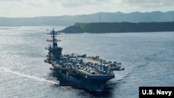 美军“罗斯福”号（USS Theodore Roosevelt）航母2020年5月21日驶离关岛，前往菲律宾海执行任务。