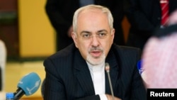 FILE - Iran's Foreign Minister Mohammad Javad Zarif attends a working luncheon in Kuwait.