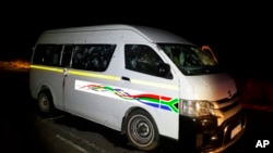 A minibus with bullet holes on its side is seen on the road between Weenen and Colenso, in KwaZulu Natal province, South Africa, early Sunday, July 22, 2018. 