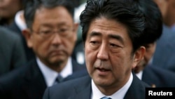 FILE - Japan's Prime Minister Shinzo Abe speaks to the media.