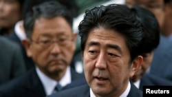 FILE - Japan's Prime Minister Shinzo Abe speaks to the media.