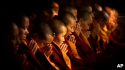 FILE - Buddhist nuns.