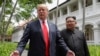El presidente de EE.UU. Donald Trump, y el líder de Corea del Norte, Kim Jong Un, se detienen para hablar con la prensa en su primer encuentro en Singapore. Junio 12, 2018.