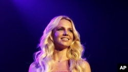 Spears smiles on stage at the 2011 Wango Tango concert in Los Angeles.