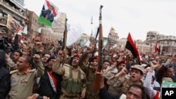 After the start of a Saudi-led airstrike campaign, Shiite rebels known as Houthis protest in Sana'a, March 26, 2015. 