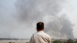 萊達雅中國工廠被放火後冒出的濃煙。 (2021年3月14日)