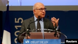 French Finance Minister Michel Sapin attends a news conference to announce the 2015 Budget Project at the Bercy Ministry in Paris, October 1, 2014.