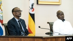 Le président rwandais Paul Kagame et son homologue angolais, le 25 mars 2018.