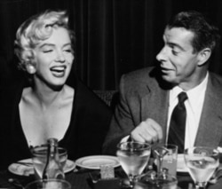 Marilyn Monroe and baseball great Joe DiMaggio; they were married for 10 months in 1954 and then divorced
