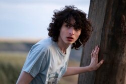 Adegan film "Ghostbusters: Afterlife" menampilkan aktor Finn Wolfhard (dok: Kimberley French/Sony Pictures via AP)