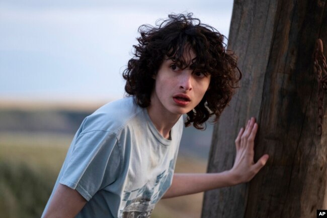 Adegan film "Ghostbusters: Afterlife" menampilkan aktor Finn Wolfhard (dok: Kimberley French/Sony Pictures via AP)