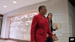 FILE - Rep. Karen Bass, D-Calif., walks through the Capitol Visitor's Center on Capitol Hill in Washington.