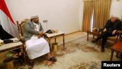 FILE - U.N. envoy to Yemen Martin Griffiths meets with Mohamed Ali al-Houthi, head of the Houthi supreme revolutionary committee, in Sanaa, Yemen, Nov. 24, 2018. 