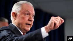 U.S. Attorney General Jeff Sessions gestures during a news conference at the Moakley Federal Building in Boston, July 26, 2018. 