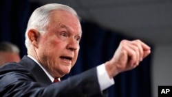 U.S. Attorney General Jeff Sessions gestures during a news conference at the Moakley Federal Building in Boston, July 26, 2018.